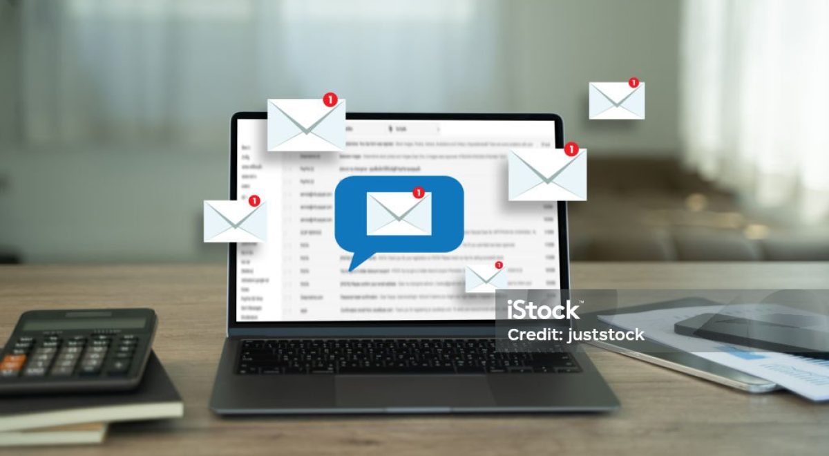 man reading e-mail on smartphone email inbox and email with laptop on internet information from spam mail